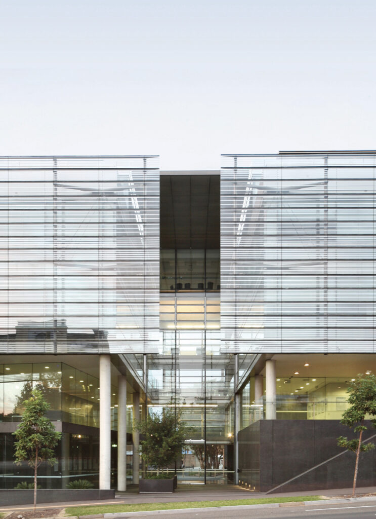 School of Information Technologies, University of Sydney, designed by fjmt: layers of glass and landscape to shelter innovation and technology.